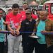 Sekretaris Daerah Kota Jambi, A. Ridwan, bersama perwakilan komunitas otomotif memotong pita sebagai tanda dibukanya Auto Fest 2025 di Terminal Rawasari, Sabtu (23/8/2025). (Dok, Stepanus)
