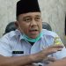 Sekda Muaro Jambi, Budhi Hartono, menyampaikan keterangan terkait pemanggilan Camat Sungai Bahar buntut polemik penampilan Drum Band MTsN 7 yang terganggu pada peringatan HUT RI, Selasa (19/8/2025). (Dok, Stepanus)