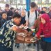 Stan kuliner UMKM lokal meramaikan perayaan HUT ke-58 PT Sinar Sentosa Primatama, Jumat (8/8/25). (Dok. Yola)