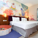 Kamar tematik anak bertema dinosaurus di Rumah Kito Resort Hotel Jambi, dilengkapi fasilitas bermain untuk anak dan dirancang khusus bagi keluarga yang ingin menikmati liburan bersama. (Dok. Rumah Kito)