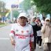 Kepala Dinas PUPR Provinsi Jambi, Muzakir, ikut serta dalam jalan santai peringatan HUT ke-80 RI di Kota Jambi, Sabtu (23/8/2025). (Dok. Stepanus)