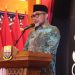 Sekretaris Daerah Provinsi Jambi, Dr. H. Sudirman, SH., MH., memberikan sambutan saat melepas Kontingen BAPOMI Jambi yang akan bertanding di POMNAS XIX Tahun 2025 di Jawa Tengah, Jumat (12/9/2025). (Dok. Daus)