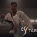 Seorang atlet taekwondo memperagakan jurus bela diri sebagai bagian dari kampanye menjelang Pekan Olahraga Nasional (PON) Bela Diri 2025 di Kudus, Jawa Tengah. (Dok. Humas)