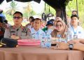 Kapolresta Jambi Kombes Pol Boy Sutan Binanga Siregar, S.I.K., M.H. bersama jajaran menghadiri kegiatan Penanaman Jagung Serentak Kuartal IV. Rabu (8/10/2025). (dok. nahar)