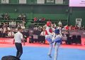 Atlet taekwondo Jambi, M. Wijaya Hamzah (pelindung merah), beraksi melawan Pandu Wijaya dari DKI Jakarta dalam partai final kelas under 75 kg PON Bela Diri 2025 di GOR Djarum, Kudus, Jawa Tengah, Minggu (12/10/2025). (Dok. Koni Jambi)