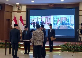 Prosesi pelantikan Kepala Lapas Kelas IIA Jambi di Aula Kanwil Kemenkumham Jambi, disaksikan para pejabat dan tamu undangan. (Dok. Daus)