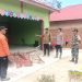 Personel Polsek Pamenang bersama TNI, BPBD, dan perangkat desa meninjau lokasi rumah warga yang terdampak banjir di Kecamatan Pamenang Selatan, Kabupaten Merangin, Minggu (26/4/2026). (Dok. Humas)