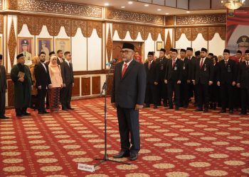 Pelantikan Sudirman sebagai Komisaris Utama PT Bank Pembangunan Daerah Jambi periode 2026-2030 di Auditorium Rumah Dinas Gubernur Jambi, Senin (27/4/2026). (Dok, Stepanus)